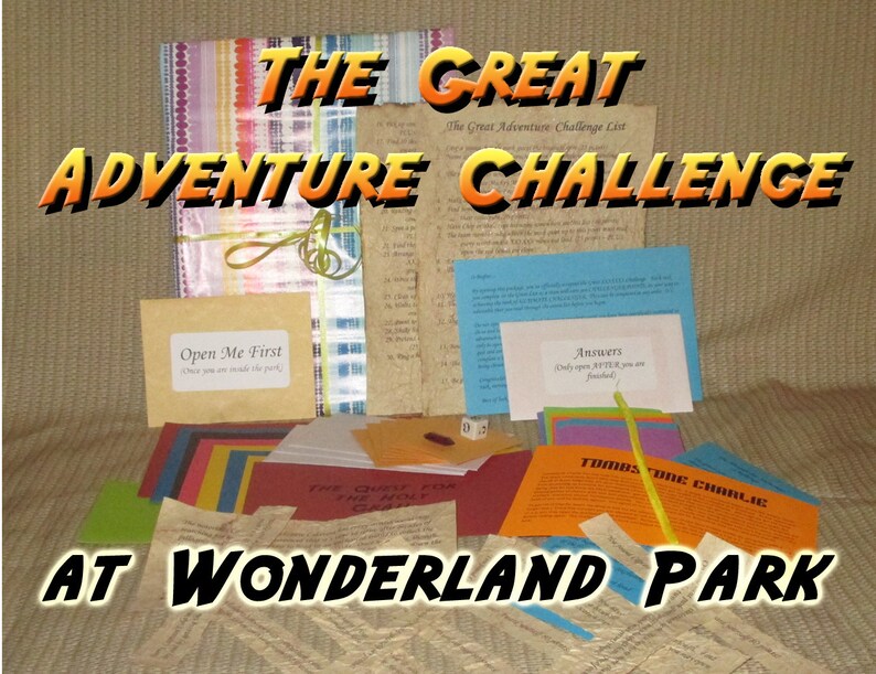 May include: A collection of adventure game materials with the text "THE GREAT ADVENTURE CHALLENGE AT WONDERLAND PARK." Includes cards, envelopes, and a list. The phrase "Open Me First" is visible on one envelope.