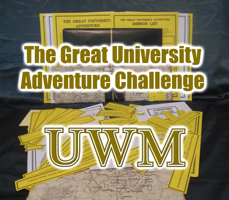 May include: A tabletop game with the text "The Great University Adventure Challenge" in gold lettering. The game includes yellow mission lists, answer sheets, and a map. The letters "UWM" are also displayed in gold.