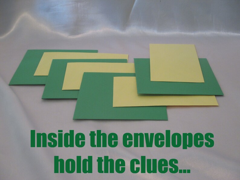 May include: Green and yellow paper squares and rectangles are arranged in a layered pattern. The text "Inside the envelopes hold the clues..." is printed in green at the bottom of the image.