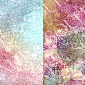 May include: Abstract art print with a colorful bubble pattern in shades of pink, blue, and gold. The print is divided into two sections, with one side featuring a lighter blue and the other side featuring a darker pink.