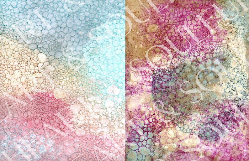 May include: Abstract art print with a colorful bubble pattern in shades of pink, blue, and gold. The print is divided into two sections, with one side featuring a lighter blue and the other side featuring a darker pink.