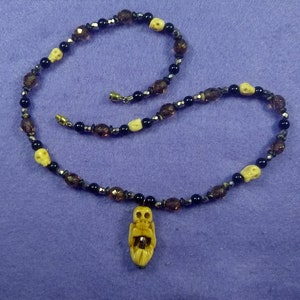 carved bone skeleton necklace