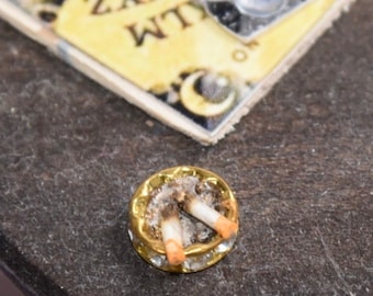 Miniature ashtray
