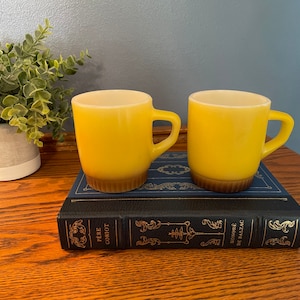 Two (2) Anchor Hocking Fire King Yellow Mugs Coffee Cups Tea Cups Mid Century Cups Set of Two D Handle