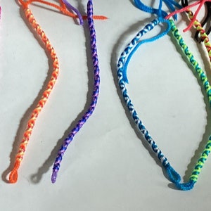 7 PULSERAS AMISTAD SURTIDAS
