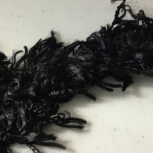 11 yards Ostrich trim color 999 black