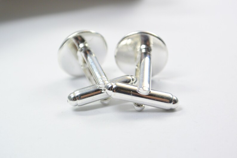 Cufflink Swirl blue