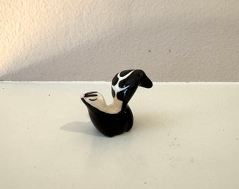 Vintage Miniature Black and White Ceramic Skunk Figurine with Pink Nose