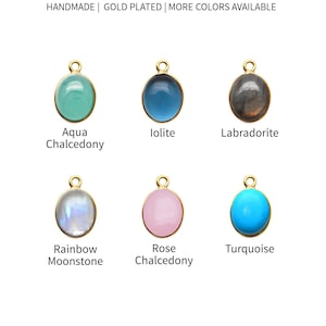 May include: Six oval-shaped pendants with gold-plated settings. The pendants are made of various gemstones, including aqua chalcedony, iolite, labradorite, rainbow moonstone, rose chalcedony, and turquoise. The pendants are 8mm by 10mm.