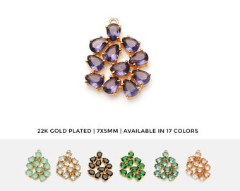 May include: Gold-plated pendant with a cluster of 12 purple teardrop-shaped stones. The pendant is 7mm x 5mm and is available in 17 colors. DIY PRONG SETTING PENDANT.