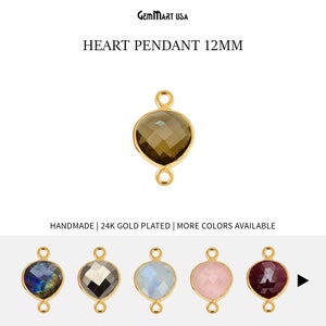 May include: Gold plated heart pendant with a 12mm gemstone. The pendant is available in multiple colors, including labradorite, hematite, moonstone, rose quartz, and ruby.