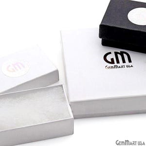 May include: A collection of three jewellery boxes including one large square white box with the black text GM GemMart USA, one small rectangular white box with a circular sticker, and one small black box with a white circular sticker on top.