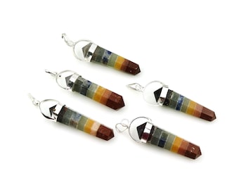 May include: Five silver-toned pendants with seven layered gemstone points. The gemstones are in shades of brown, red, yellow, green, blue, and black. The pendants are on a white background.