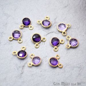 May include: Ten gold-toned metal connector charms with amethyst gemstone accents. Each charm has three loops for attaching jewellery components.