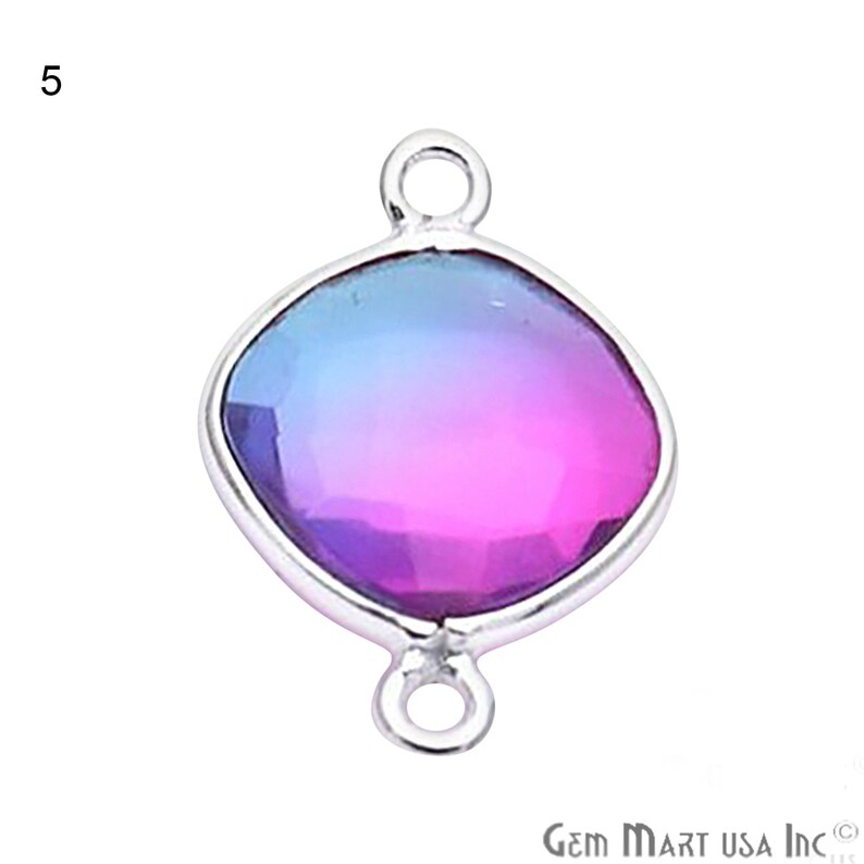 May include: A silver charm with a square-shaped, iridescent gemstone that transitions from blue to pink. The charm has two loops for attaching to a necklace or bracelet.