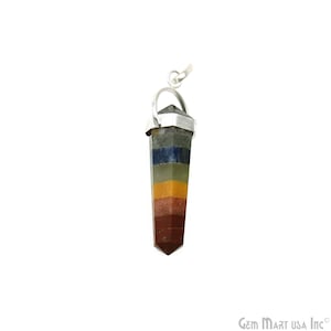 May include: A silver pendant featuring a seven-layered gemstone, each layer a different colour: red, orange, yellow, green, blue, indigo, and violet. The pendant is shaped like a point.