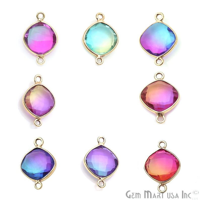 May include: Assortment of six iridescent glass gemstone connector charms with gold-tone metal settings. Each charm features a different color gradient, including pink, blue, purple, and orange.