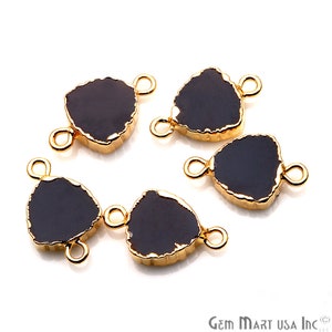May include: Five black agate gemstone connector charms with gold-plated edges and two jump rings. The charms are irregularly shaped and have a rough, natural look.