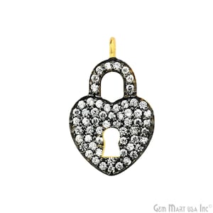 May include: A gold heart-shaped padlock charm with a keyhole and pave-set clear cubic zirconia stones.