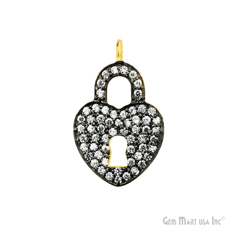 May include: A gold heart-shaped padlock charm with a keyhole and pave-set clear cubic zirconia stones.