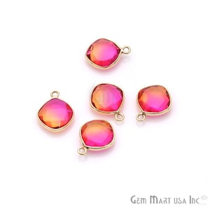 May include: Five gold-toned pendants with pink and orange ombre glass squares. Each pendant has a loop for attaching to a chain or cord.