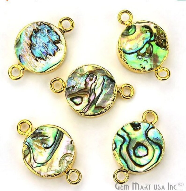 May include: Five gold-toned metal connector charms with round abalone shell inlays. Each charm has two jump rings for attaching to jewelry.