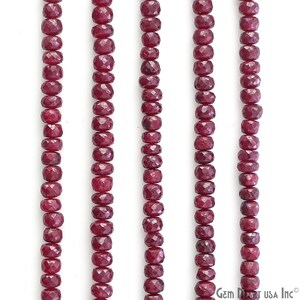 May include: Three strands of ruby red faceted gemstone beads. The beads are approximately 4mm in diameter and have a smooth, polished finish.