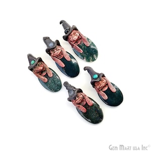 May include: Five green and brown witch pendants with black hats and turquoise accents. The pendants are made of stone and have a whimsical design.