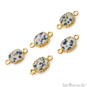 May include: Five gold-toned metal connector charms with a dalmatian jasper stone inlay. Each charm has two loops for attaching to jewelry.