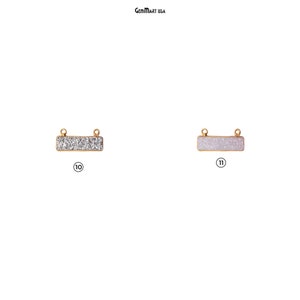 May include: Two gold-toned bar-shaped connectors with a sparkly finish. The connector on the left has a silver glitter finish, and the connector on the right has a white glitter finish. Both connectors have two loops on either end.