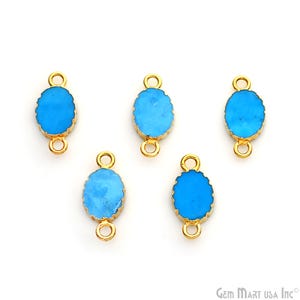 May include: Five gold-toned oval-shaped connector charms with a blue turquoise inlay. Each charm has two loops for attaching to jewelry.