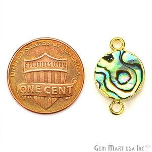 May include: Gold-tone connector with a round abalone shell inlay. The connector is about the size of a US penny.