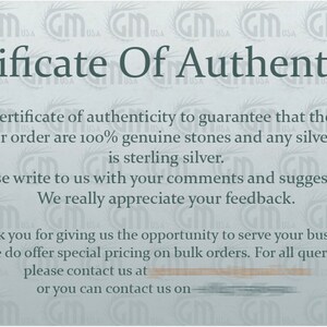 May include: A certificate of authenticity with the text "Certificate Of Authenticity" at the top. The certificate guarantees the contents are 100% genuine stones and sterling silver. It also includes a thank you message and contact information.