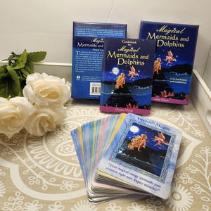 Magical Mermaids and Dolphins Oracle Deck by Doreen Virtue Pristine Condition-Cards, book and box in great shape.
