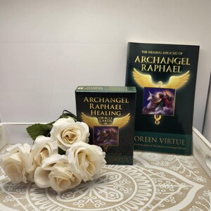 Archangel Raphael Healing Oracle Deck by Doreen Virtue in mint Condition-Cards, book and box. With matching 175 page book both very rare.