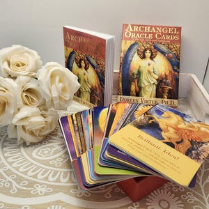 Archangel Oracle Deck by Doreen Virtue. Pristine Condition-Cards, book and box. All items in great shape.