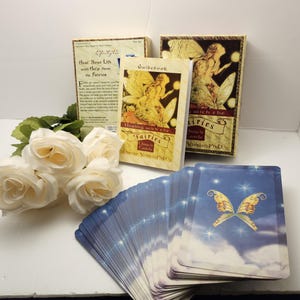 Healing with the Fairies Oracle Deck by Doreen Virtue Pristine Condition-Cards, book and box in great shape.