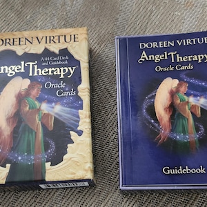 Rare Doreen Virtue Angel Therapy Oracle Card set. One of the rarest of this famous artist's deck of cards.