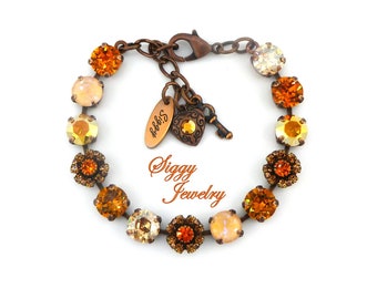SUNLIT BLOSSOMS Tennis Bracelet Made with Genuine Austrian Crystals and Flower Embellishments in Golden and Orange Hues, Siggy Jewelry