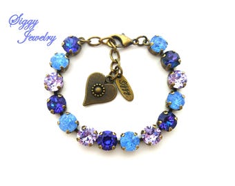 Pulseira de tênis de cristal azul e roxo com pingentes: acabamentos variados, feita à mão pela SIGGY JEWELRY