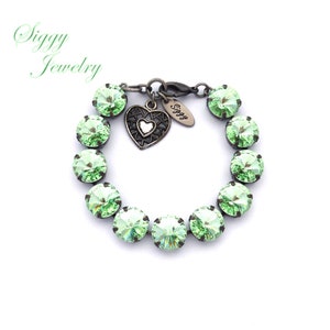 Austrian Crystal Tennis Bracelet, Pale Chrysolite Light Green, 12mm Large Round Rivoli, Bridesmaids Gift, Heart Charm, Assorted Finishes