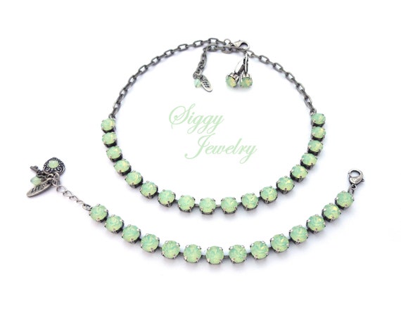 Parure en Acier Inoxydable Doré - Ensemble de Trois Pièces - Collier - Boucles d'Oreilles - Bracelet