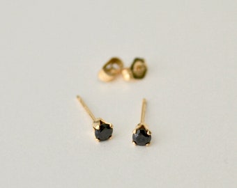 black and gold studs