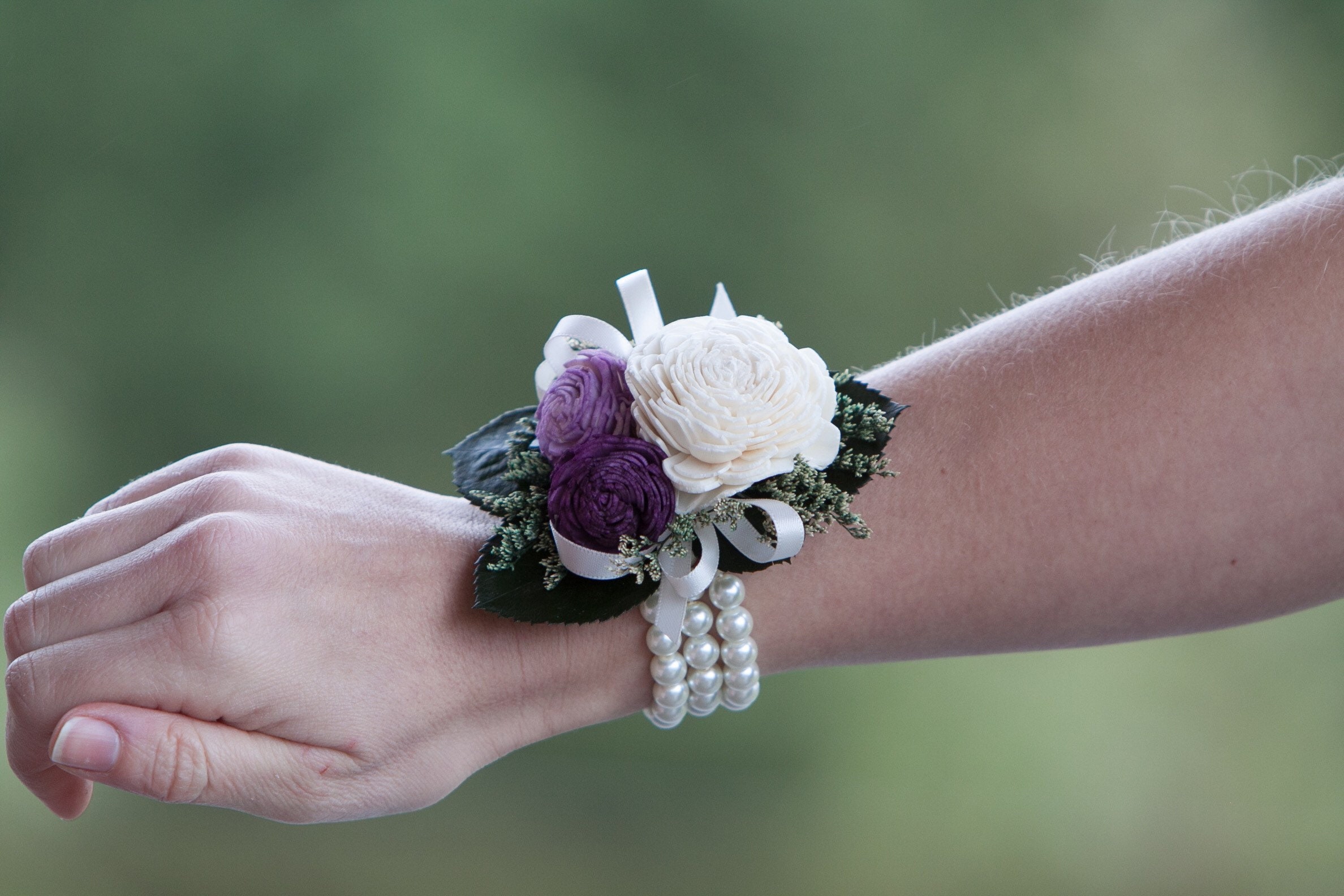 Woman's Purple and Ivory Beaded Wristlet Corsage