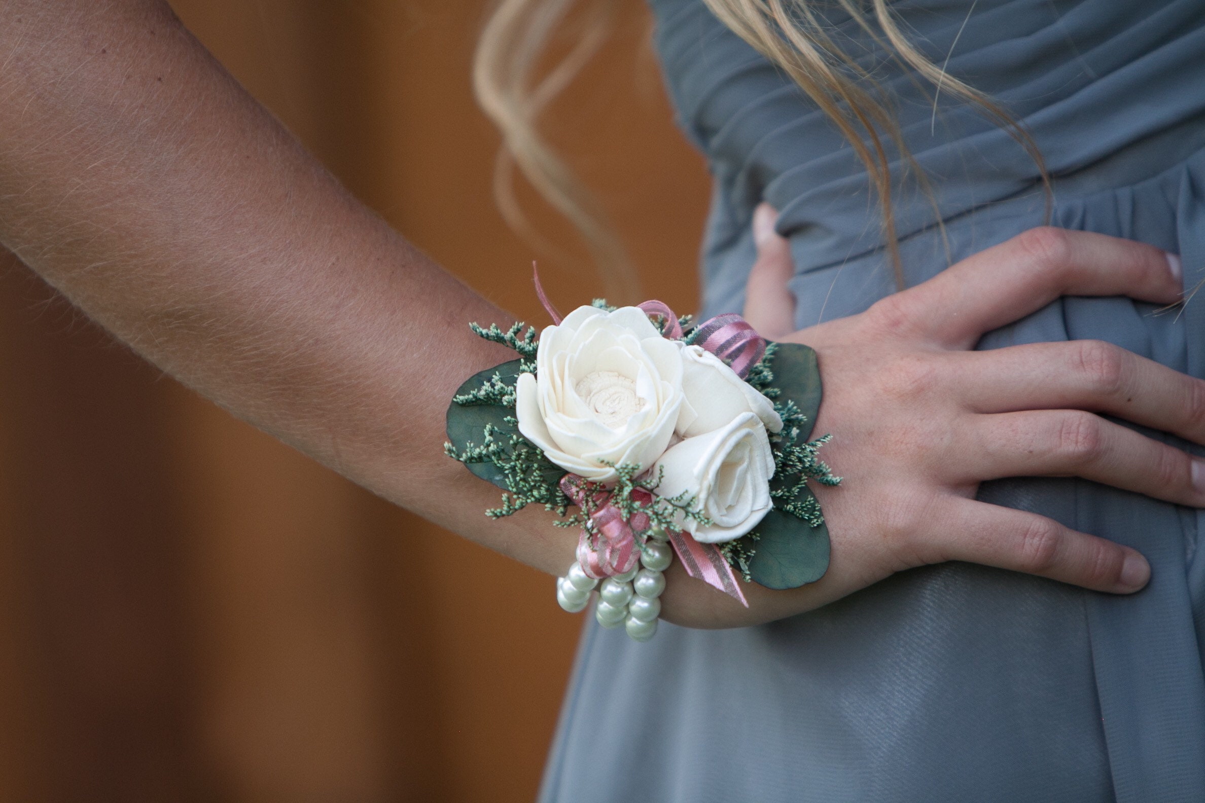 Woman’s Ivory Wrist Corsage
