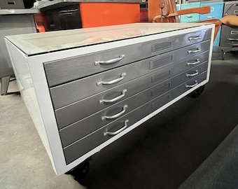Vintage white frame with brushed steel drawers flat file coffee table cabinet - with locking castors and glass top