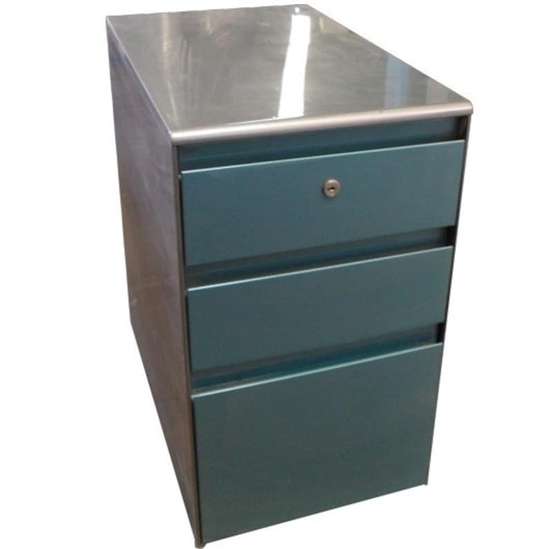 May include: A teal metal file cabinet with three drawers and a stainless steel top.