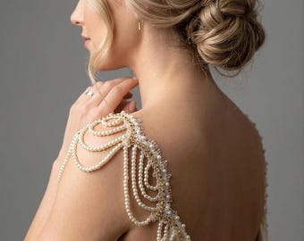 Vestido de novia con encaje y perlas y tirantes extraíbles