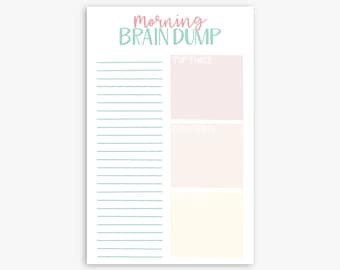 May include: A printable brain dump planner with the text "morning brain dump" in pink and green. The planner is divided into three sections: "top three", "easy three", and "must three".