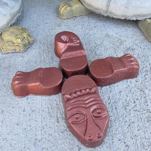May include: Five brown, hand-painted, concrete turtle figurines. The figurines are in various poses, including a turtle with its head up, a turtle with its head down, and a turtle with its legs outstretched. The figurines are a great addition to any garden or home.